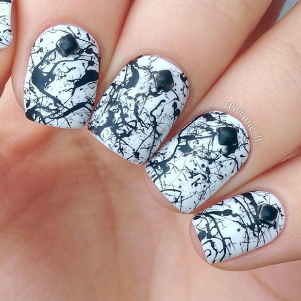 Ongles éclaboussés en noir et blanc