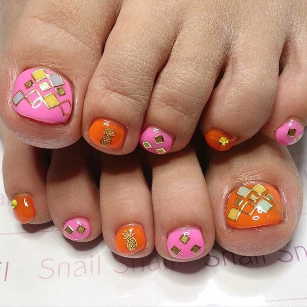 Conception d'ongles d'orteil rose, orange et or