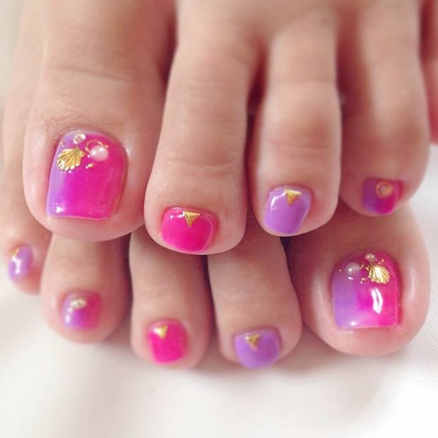 Conception d'ongles d'orteil rose et violet