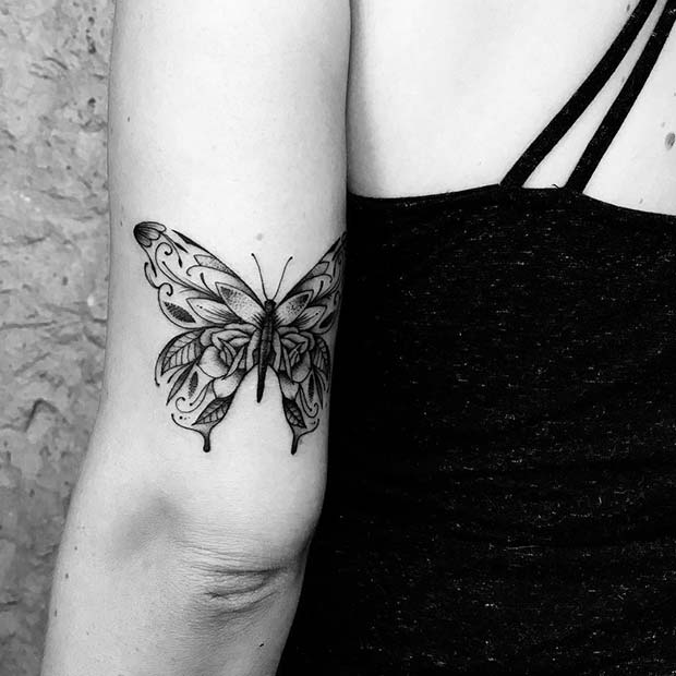 Beau tatouage de bras de papillon