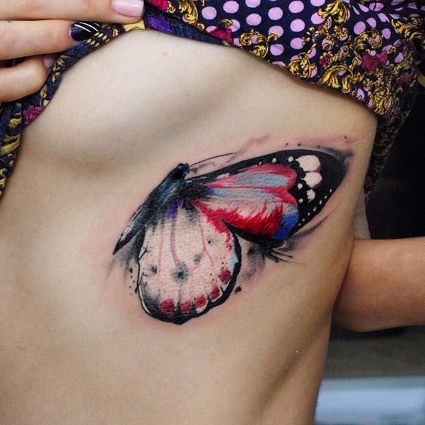 Grand et artistique tatouage de papillon aquarelle