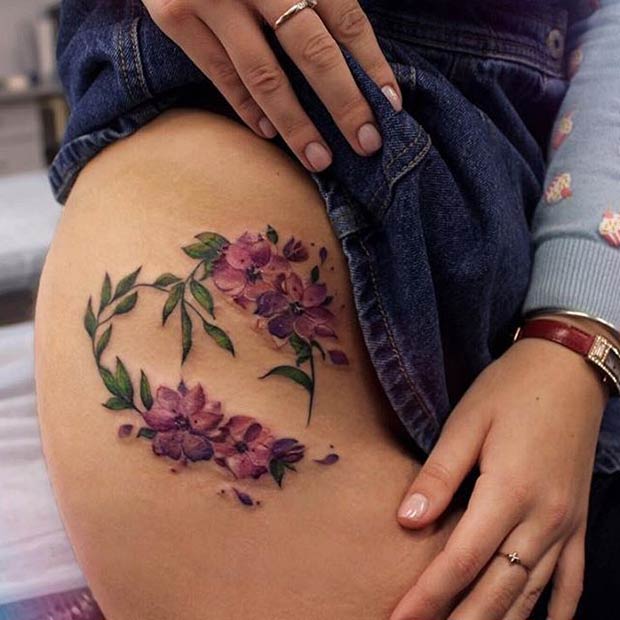 Ιδέα τατουάζ άνθους μηρού άνω πλευράς για γυναίκες