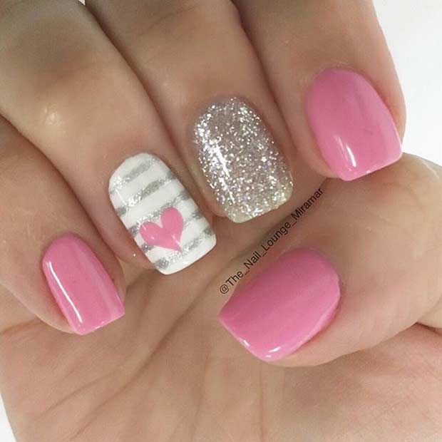 Conception d'ongles coeur rose et argent