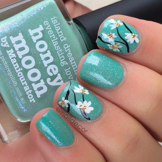 Conception d'ongles fleur turquoise