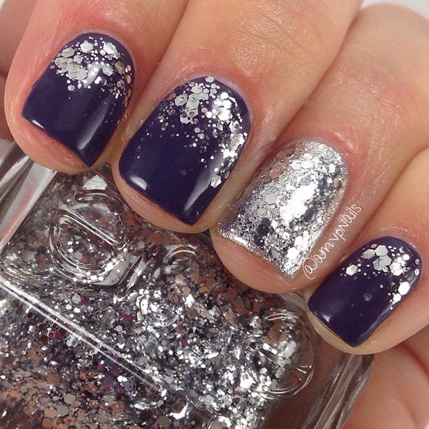 Conception d'ongles sombres avec des paillettes d'argent