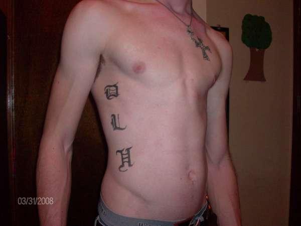 Guy Initials Tattoo