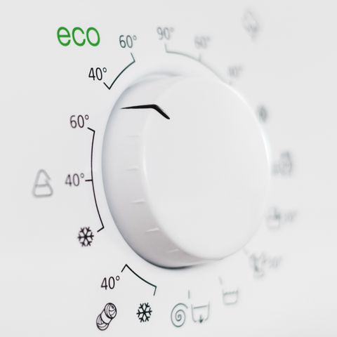 מתג מכונת הכביסה מוגדר למצב חסכוני או אקולוגי רדום כמות קטנה של תבואה שנוספה בכוונה לקבלת רושם סופי טוב יותר