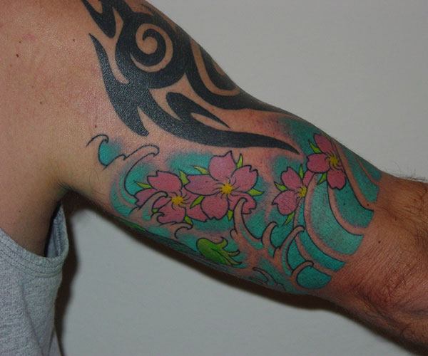 Pretty Half Sleeve Tattoo